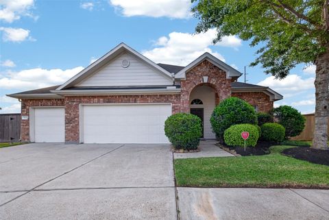 Photo of 873 Grassy Knoll Trail, La Marque, TX 77568 (MLS # 71150598)