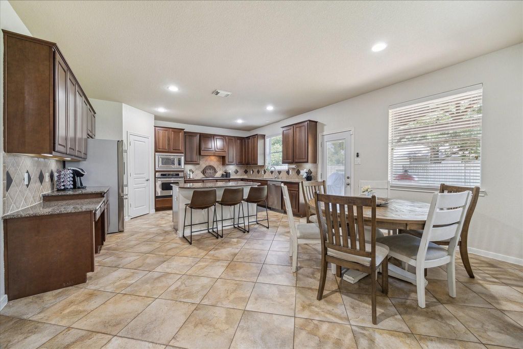Photo of 11911 Lake Mead Lane, Humble, TX 77346 (MLS # 58364436)