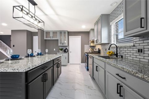 Photo of 9226 Macmillan Lane, Houston, TX 77083 (MLS # 90396841)
