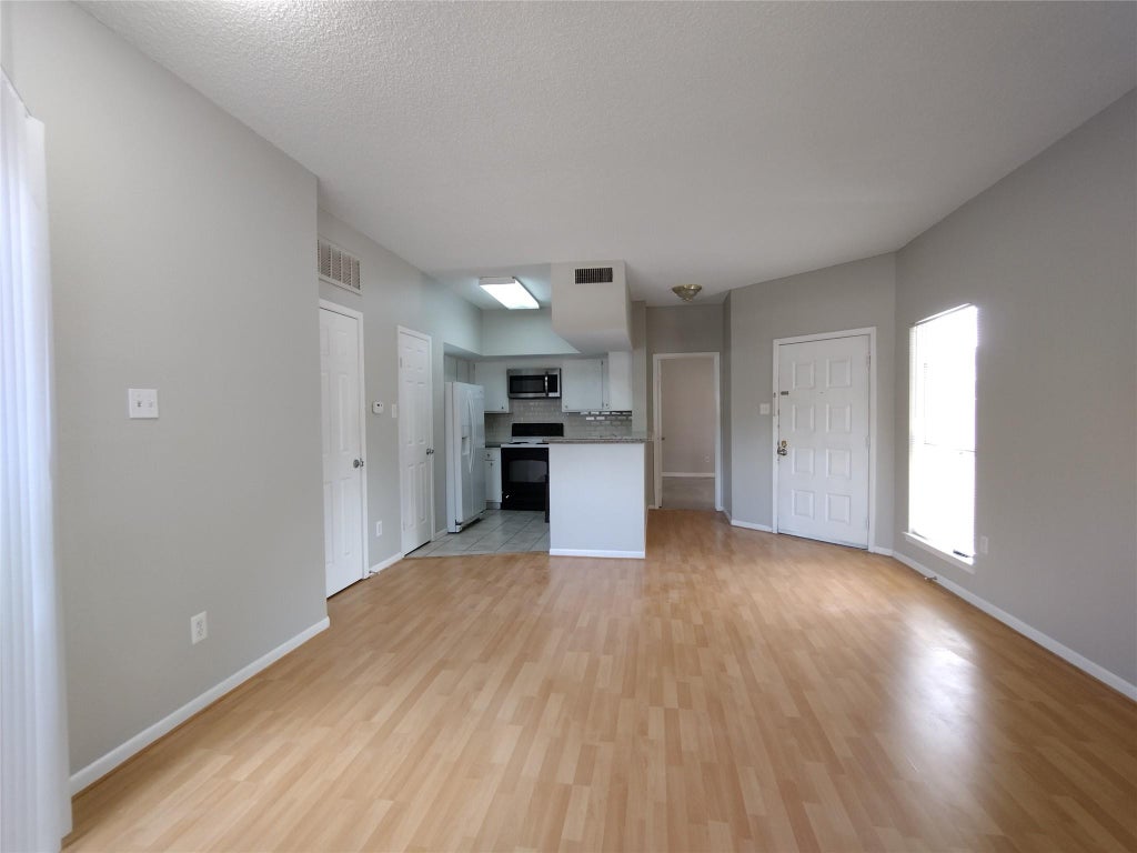 Photo of 10855 Meadowglen Lane #601, Houston, TX 77042 (MLS # 79585115)