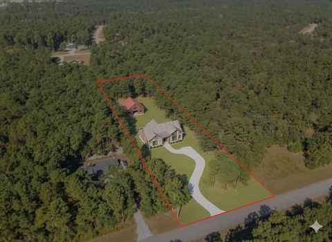 Photo of 185 Rim Rock Road, Huntsville, TX 77340 (MLS # 63170774)