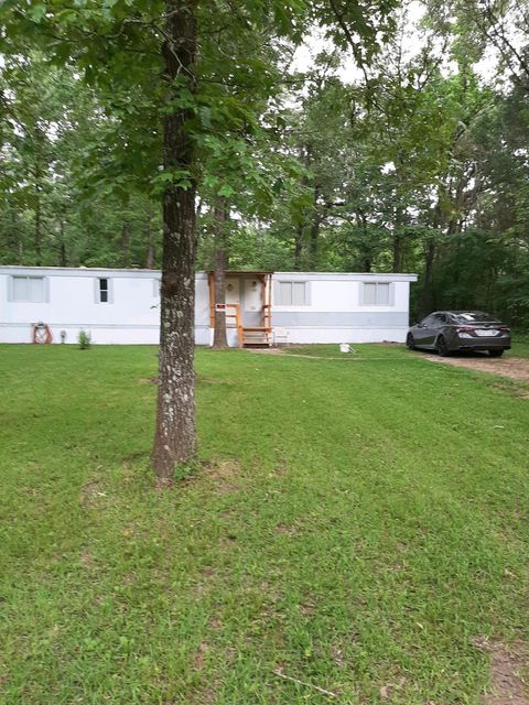 Photo of 19 Dogwood Drive, Huntsville, TX 77340 (MLS # 12840060)