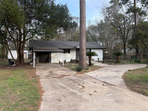 Photo of 1301 Magnolia Point Dr, Huffman, TX 77336 (MLS # 76631903)