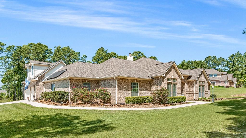 Photo of 12434 Longmire Way Way, Conroe, TX 77304 (MLS # 55881909)