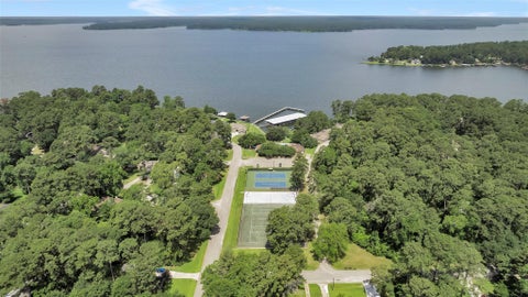 Photo of 13987 Lakepoint Drive, Willis, TX 77318 (MLS # 38747363)