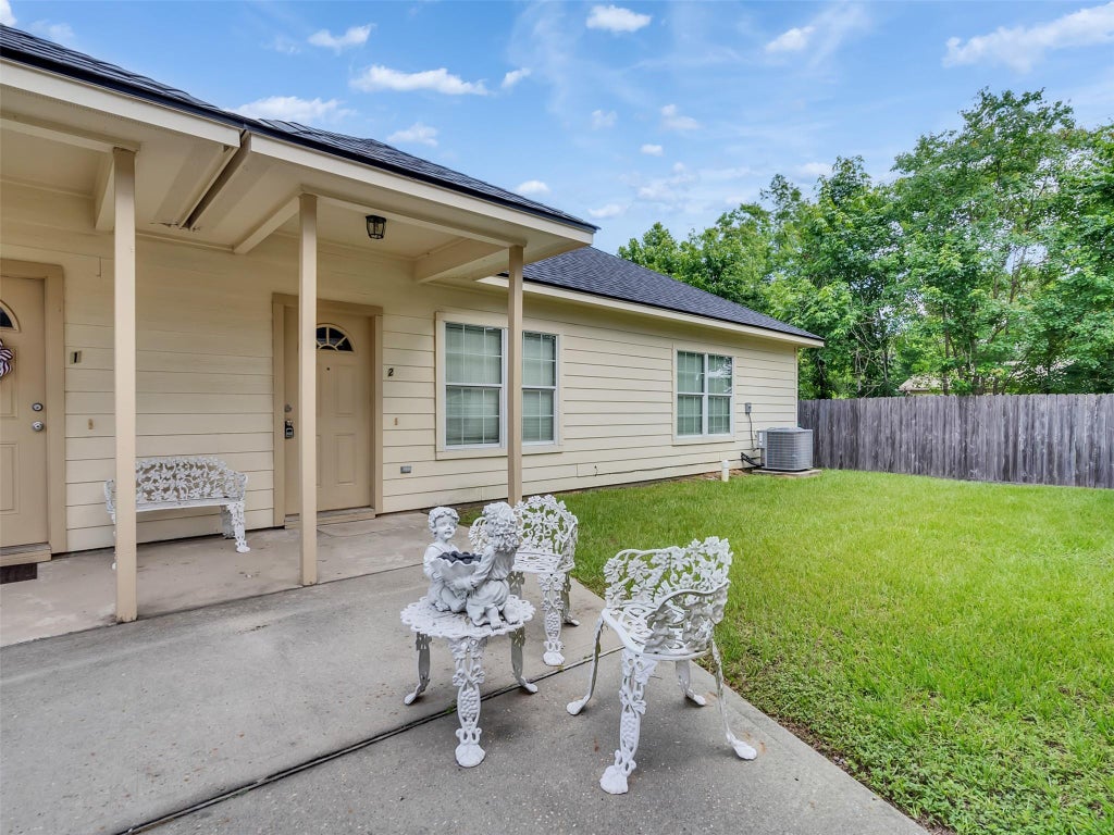 Photo of 104 Longstreet Road #2, Willis, TX 77378 (MLS # 48636063)