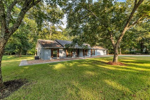 Photo of 11635 Forest Glen Drive, Willis, TX 77318 (MLS # 93126925)