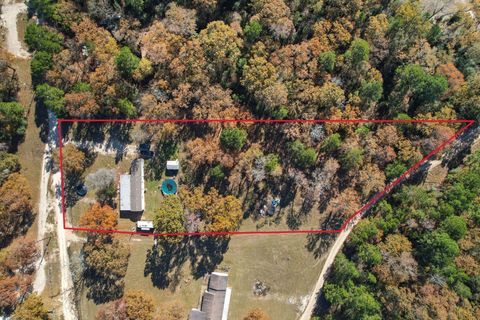 Photo of 305 Thomas Lane, Trinity, TX 75862 (MLS # 28599609)