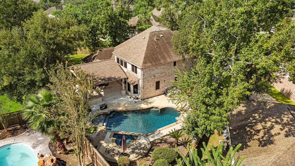 Photo of 14118 Tealstone Falls Court, Houston, TX 77044 (MLS # 48420161)