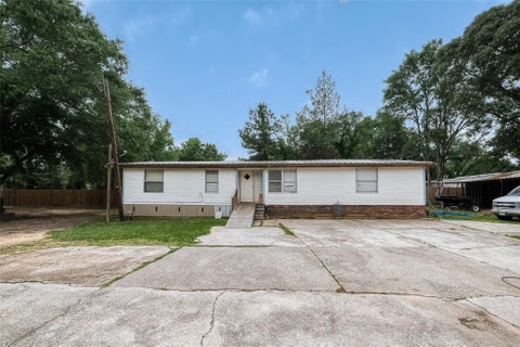 Photo of 829 Porter Road, Conroe, TX 77301 (MLS # 49616290)