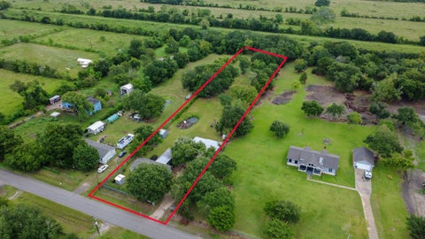 Photo of 5027 Farmer Road, Alvin, TX 77511 (MLS # 75102244)