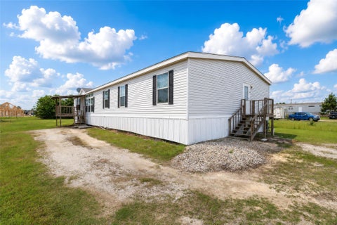 Photo of 275 Road 5132, Cleveland, TX 77327 (MLS # 56906450)