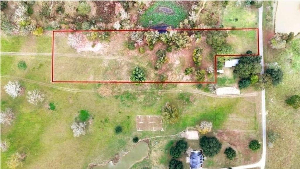 Photo of 0 County Road 2090, Liberty, TX 77575 (MLS # 54115851)