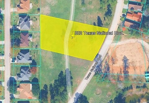 Photo of 2 Texas National Blvd, Willis, TX 77303 (MLS # 11626000)