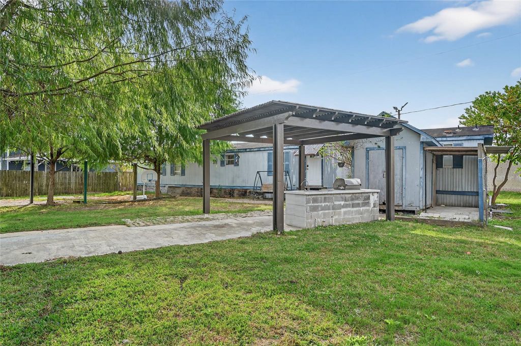 Photo of 9619 Meadowvine Drive, Houston, TX 77044 (MLS # 78751415)