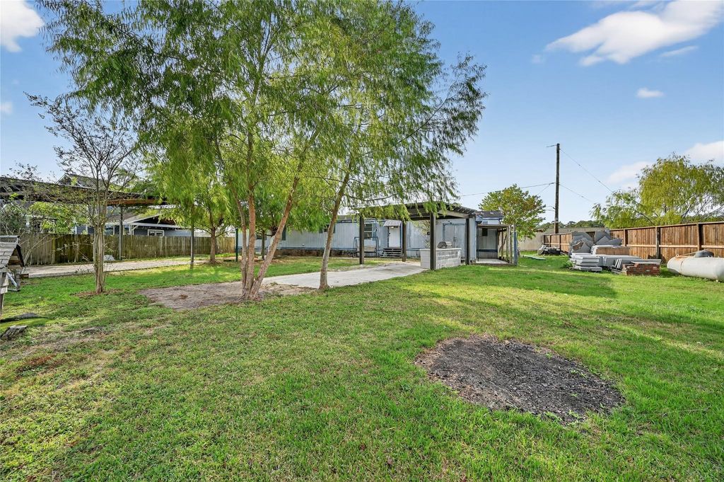 Photo of 9619 Meadowvine Drive, Houston, TX 77044 (MLS # 78751415)