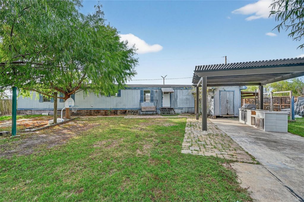 Photo of 9619 Meadowvine Drive, Houston, TX 77044 (MLS # 78751415)