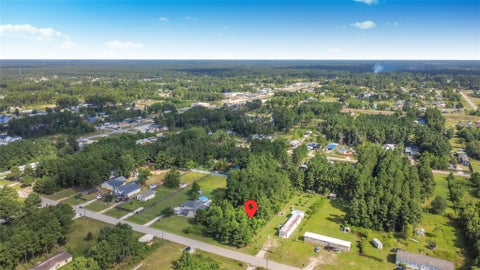 Photo of 183 County Road 3560, Cleveland, TX 77327 (MLS # 84488833)