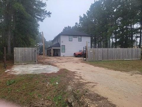 Photo of 774 County Road 3542, Cleveland, TX 77327 (MLS # 51183998)