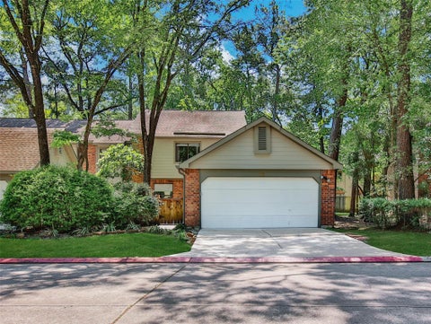 Photo of 24 W Willowwood Court, Spring, TX 77381 (MLS # 80366444)