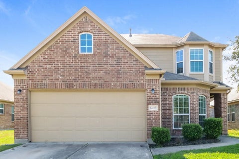 Photo of 12210 Zenith Ridge Way, Humble, TX 77346 (MLS # 33673852)