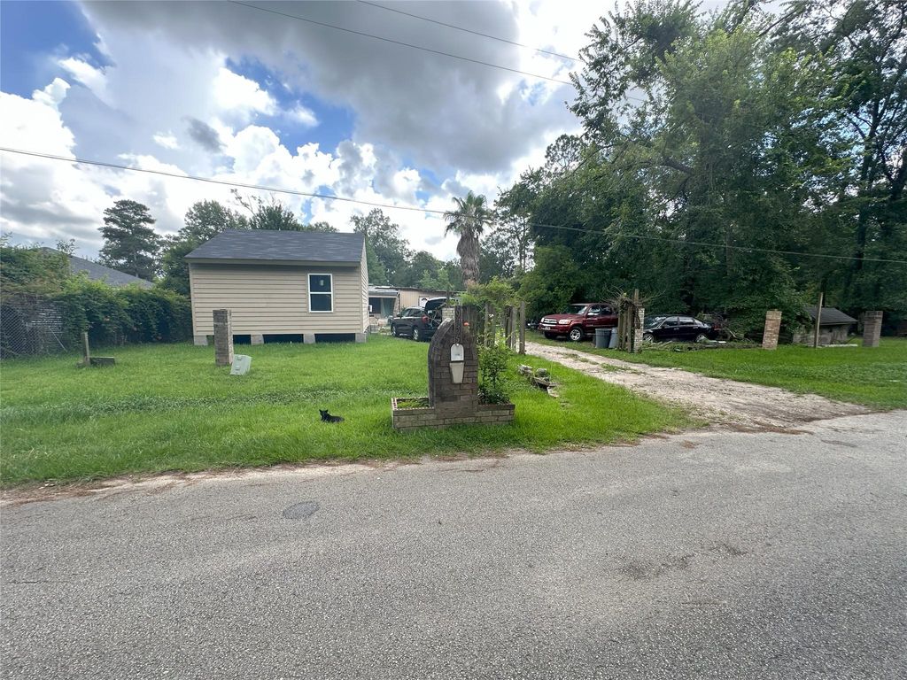 Photo of 19795 Live Oak N N, New Caney, TX 77357 (MLS # 91625244)