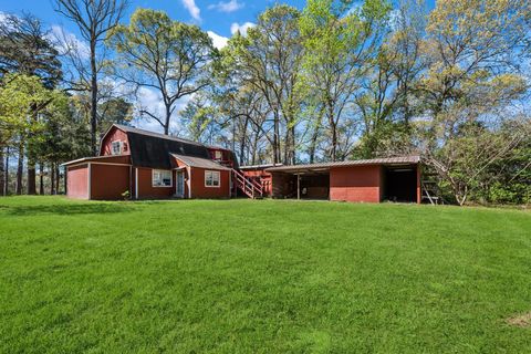 Photo of 1368 Fish Hatchery Road, Huntsville, TX 77320 (MLS # 31602746)
