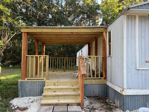 Photo of 66 Mcfaddin Road, Huntsville, TX 77340 (MLS # 23680809)
