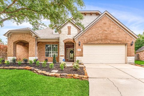 Photo of 16802 Cherokee Lake Lane, Houston, TX 77044 (MLS # 56189874)