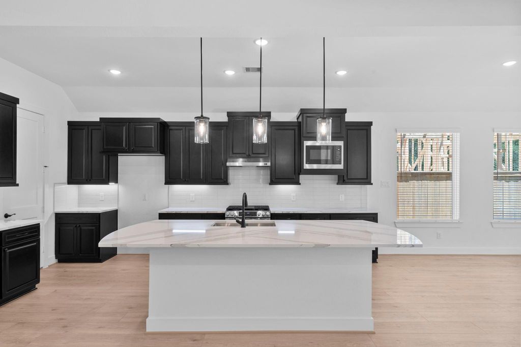 Photo of 9753 Roaring River Falls Ln, Porter, TX 77365 (MLS # 65398399)