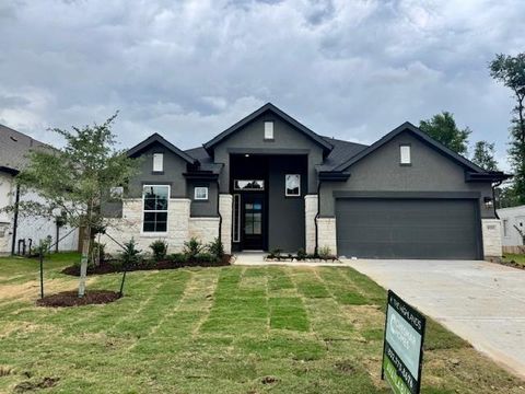Photo of 9753 Roaring River Falls Ln, Porter, TX 77365 (MLS # 65398399)