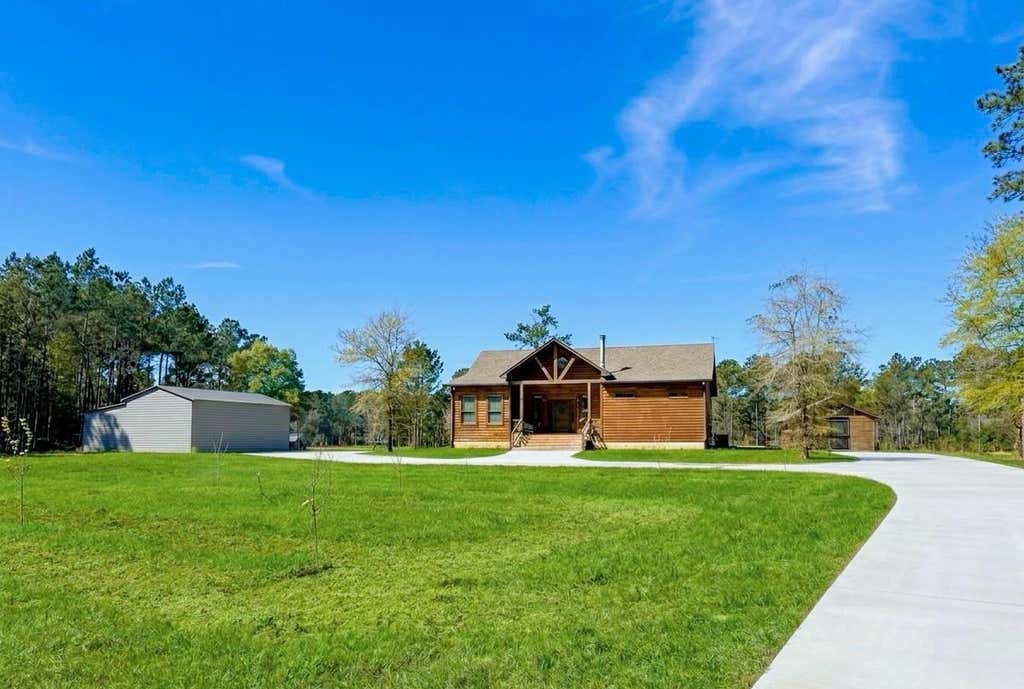 Photo of 214 Hunters Hill Road, Oakhurst, TX 77359 (MLS # 17923405)