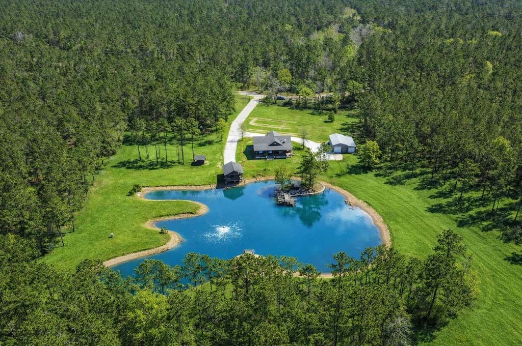 Photo of 214 Hunters Hill Road, Oakhurst, TX 77359 (MLS # 17923405)