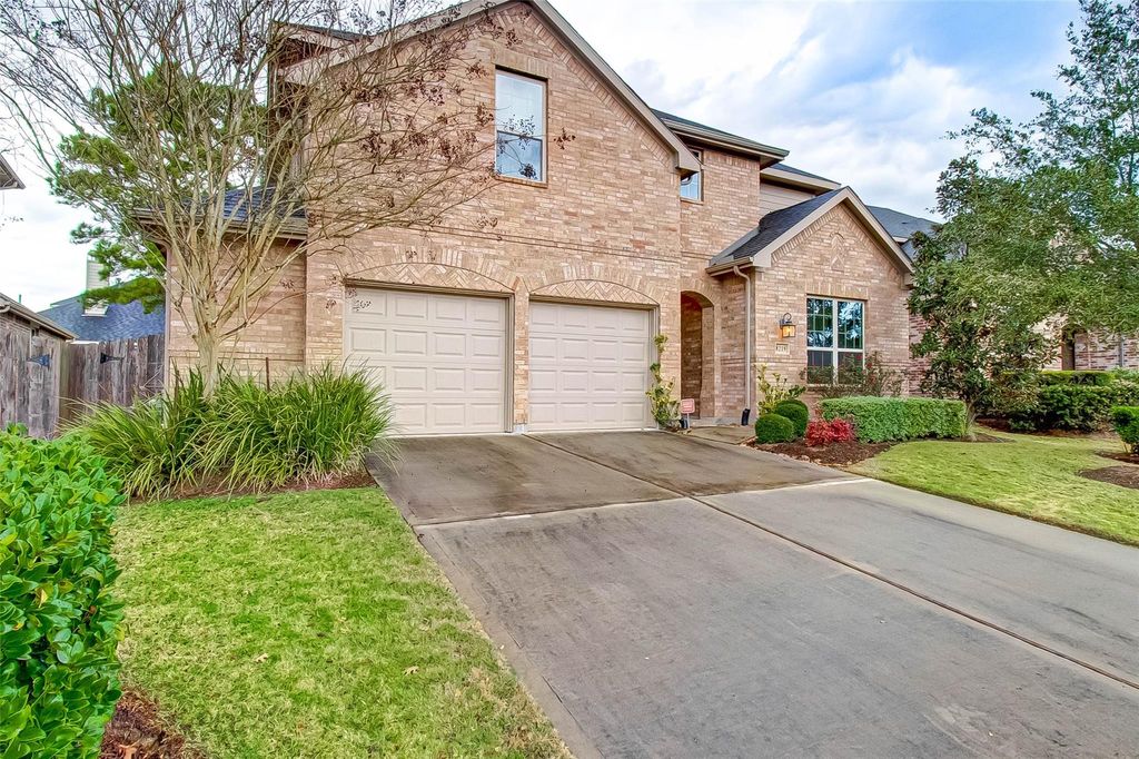 Photo of 8219 Peppervine Court, Conroe, TX 77385 (MLS # 96765034)