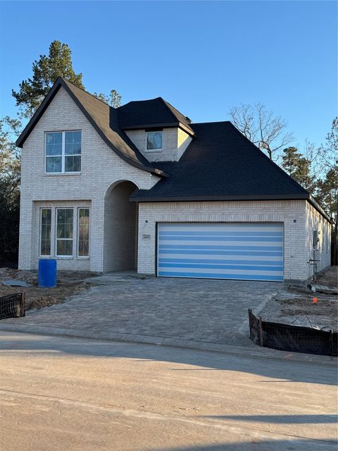 Photo of 26027 S Outrider Banks Cir, Montgomery, TX 77316 (MLS # 26730356)