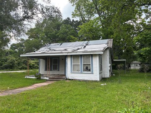 Photo of 1101 N Blair Avenue, Cleveland, TX 77327 (MLS # 84093644)