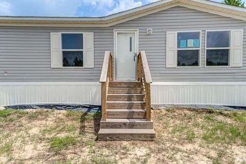 Photo of 5055 County Road 3540, Cleveland, TX 77327 (MLS # 48813315)