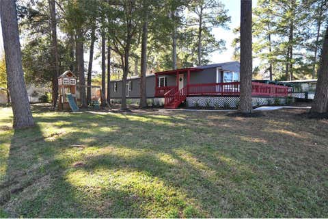 Photo of 13721 Brigadier Dr DR, Willis, TX 77318 (MLS # 5910553)
