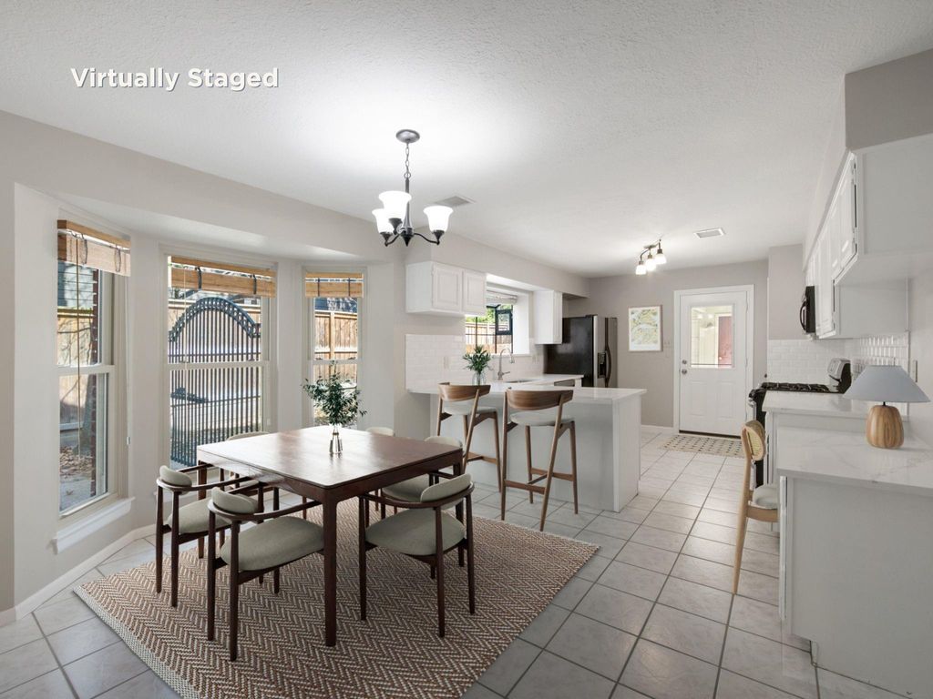 Photo of 3910 Forest Village Drive Dr, Kingwood, TX 77339 (MLS # 13336581)