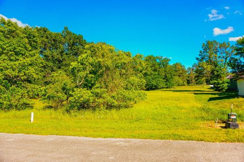 Photo of 155 Wildwood Lake Drive N, Huntsville, TX 77340 (MLS # 30671960)