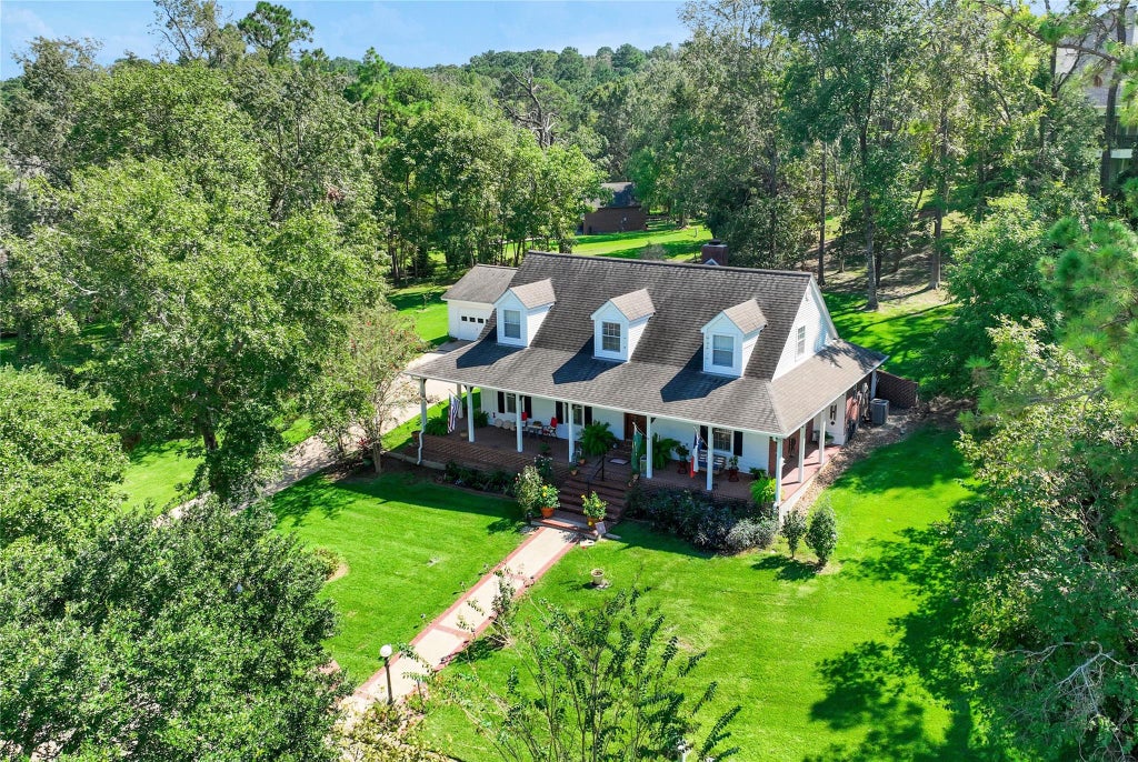 Photo of 220 Lake Oaks Boulevard, Coldspring, TX 77331 (MLS # 18332030)