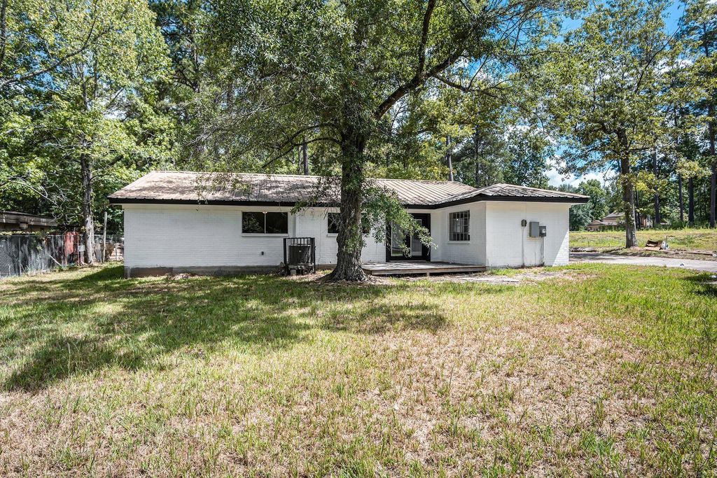 Photo of 1702 Athens Drive, New Caney, TX 77357 (MLS # 75282780)