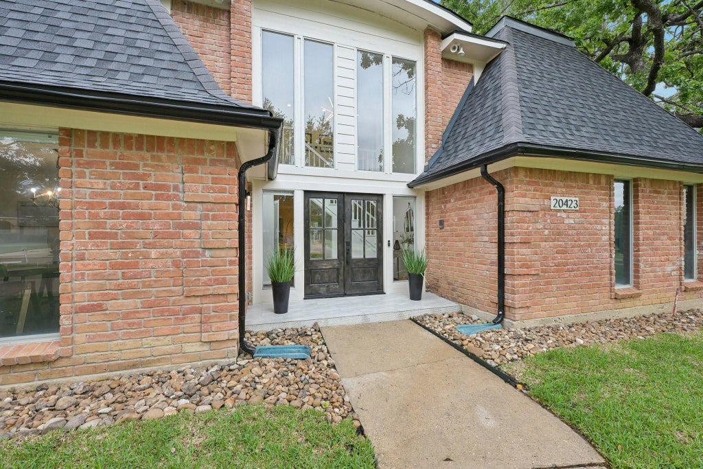Photo of 20423 Woodsong Court, Humble, TX 77346 (MLS # 10001837)