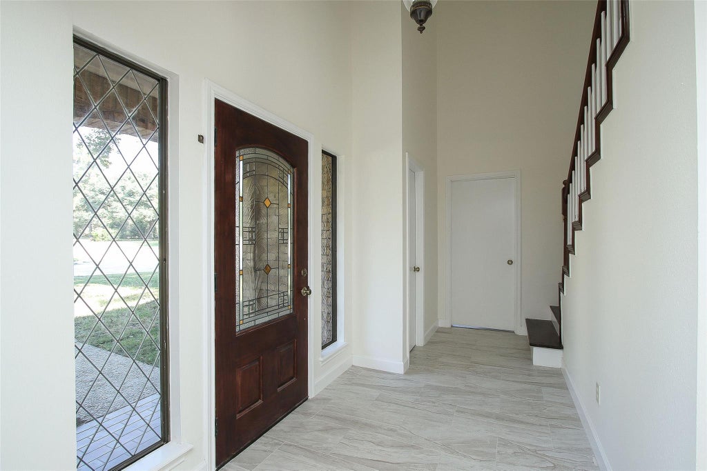 Photo of 5422 Windy Lake Drive, Houston, TX 77345 (MLS # 91973280)
