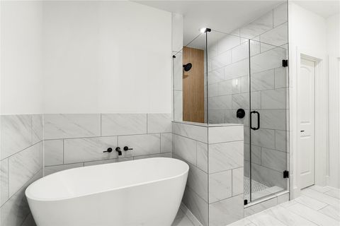 Tiny photo for 1614 Ojeman Road Rd #E, Houston, TX 77055 (MLS # 96723426)