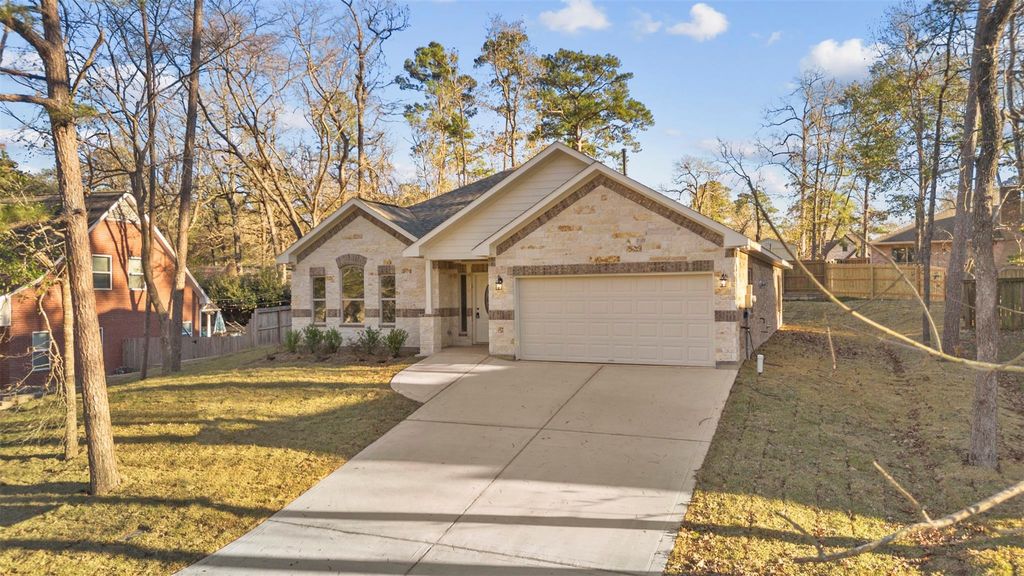 Photo of 512 Sandy Oaks Drive, Huntsville, TX 77340 (MLS # 92085652)