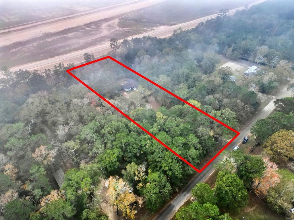 Photo of 58 County Road 3893 E, Cleveland, TX 77328 (MLS # 12576270)