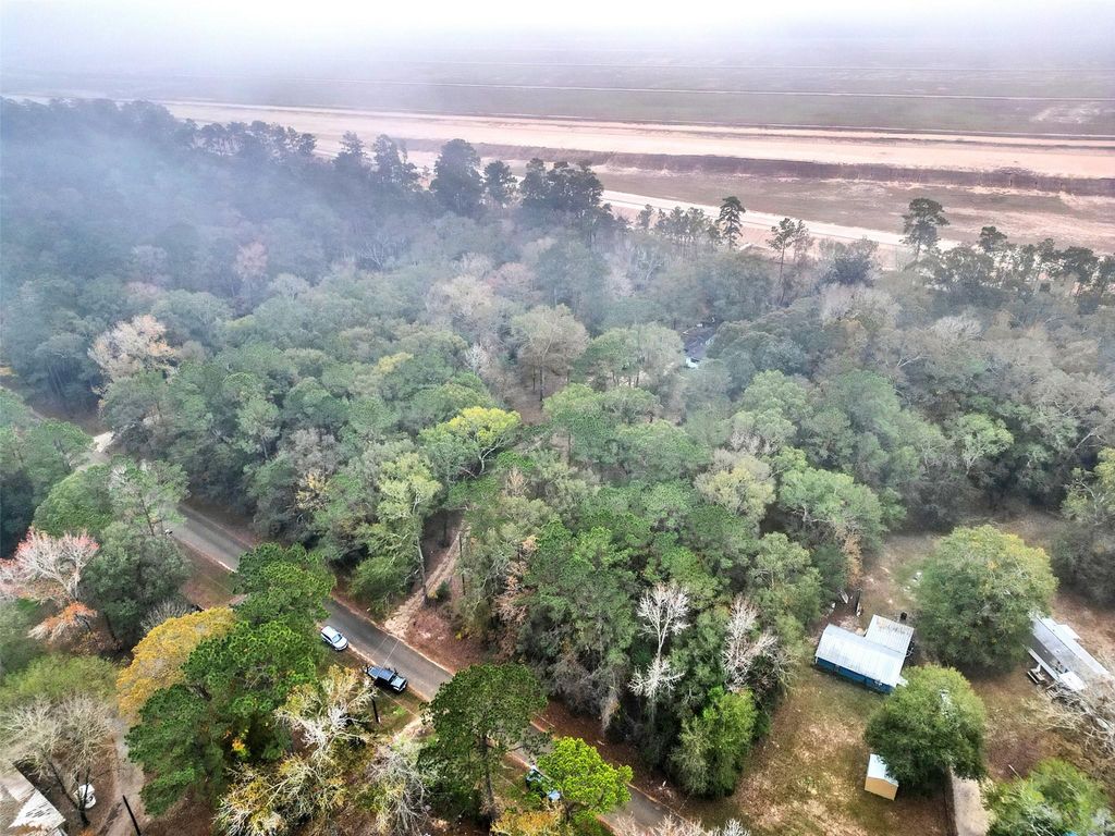 Photo of 58 County Road 3893 E, Cleveland, TX 77328 (MLS # 12576270)