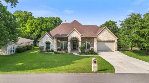 Photo of 13336 Lake Breeze Lane, Willis, TX 77318 (MLS # 95276416)