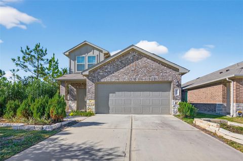 Photo of 14432 Sugar Pines Drive Dr, Conroe, TX 77302 (MLS # 54417224)